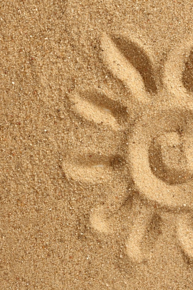 Рисунок солнца на песке