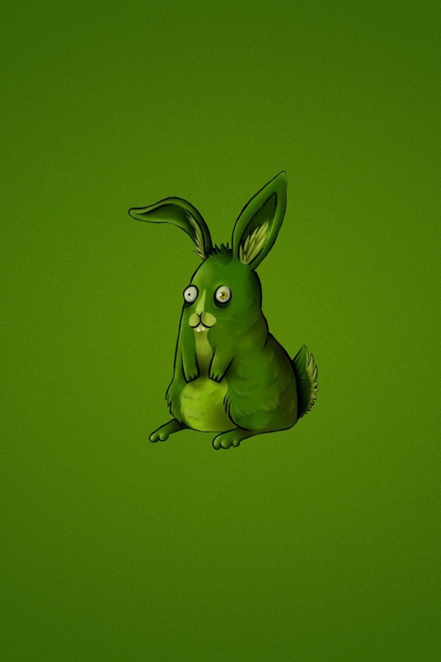 Зеленый кролик на зеленом фоне