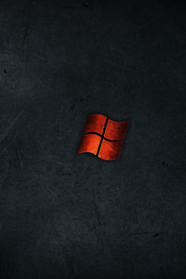 Оранжевый флажок Microsoft Windows на черном фоне