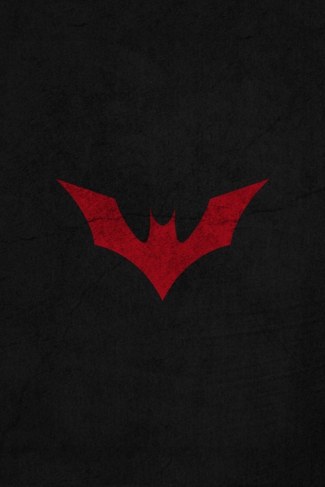 Красная летучая мышь на черном фоне