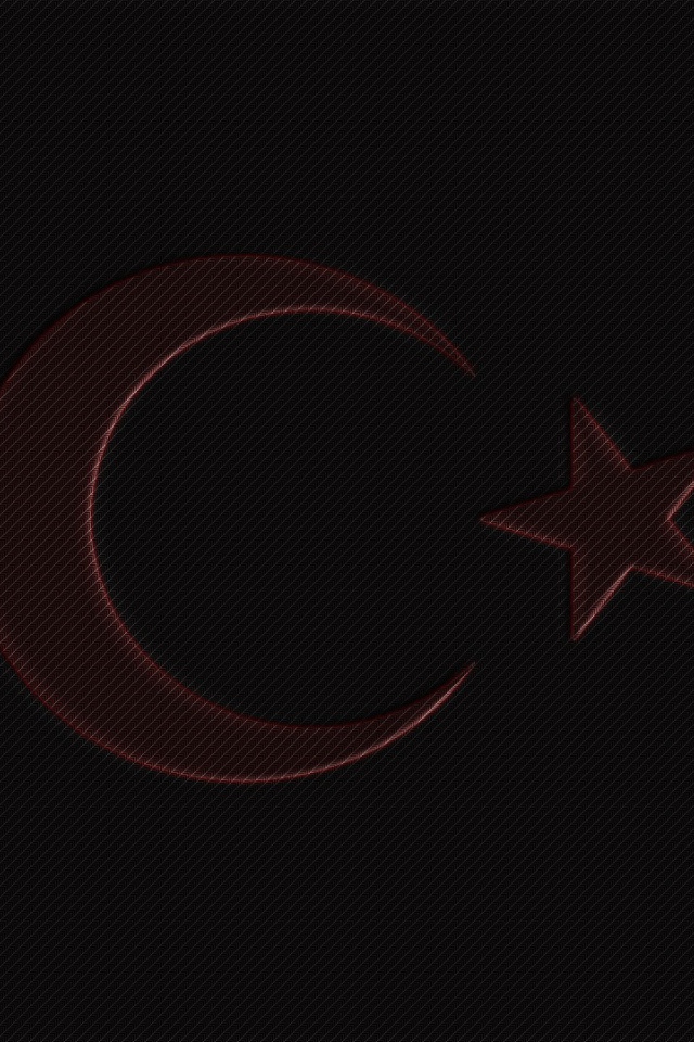 Красная луна и звезда на черном фоне