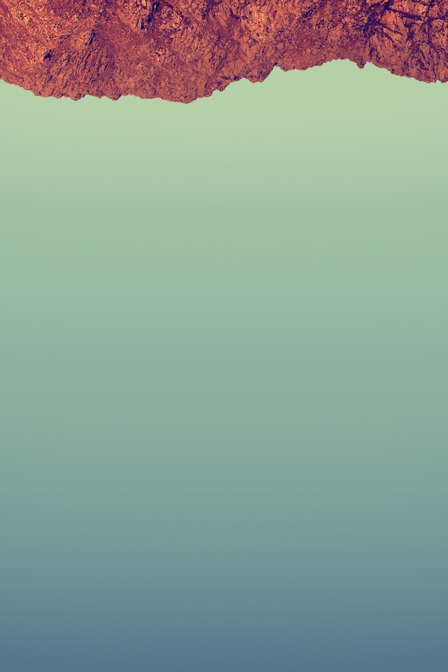 Красный камень на сером фоне