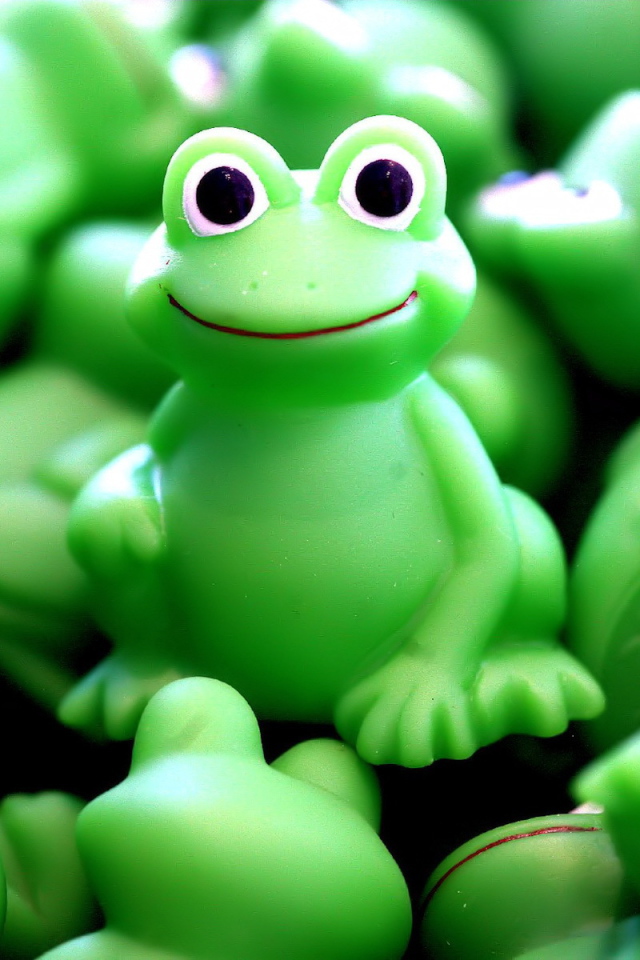 Игрушка лягушка