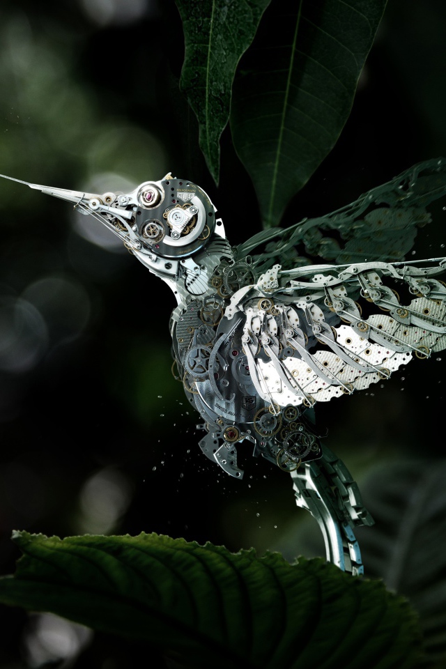 Механическая птица у цветка