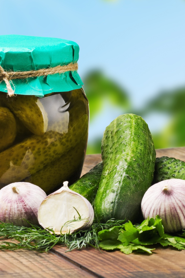 	   Pickled cucumber in glass containers