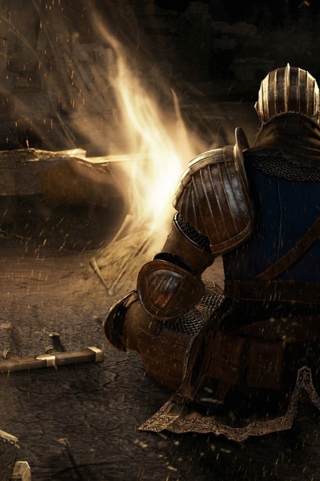 Солдат в доспехах у костра в игре Dark Souls