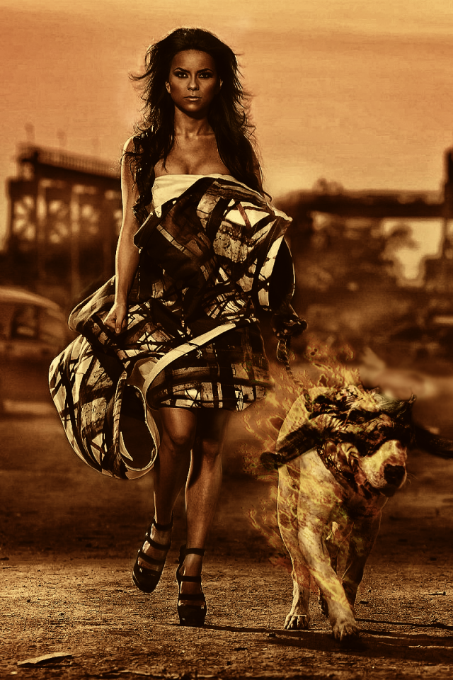 Женщина с собакой на фоне руин