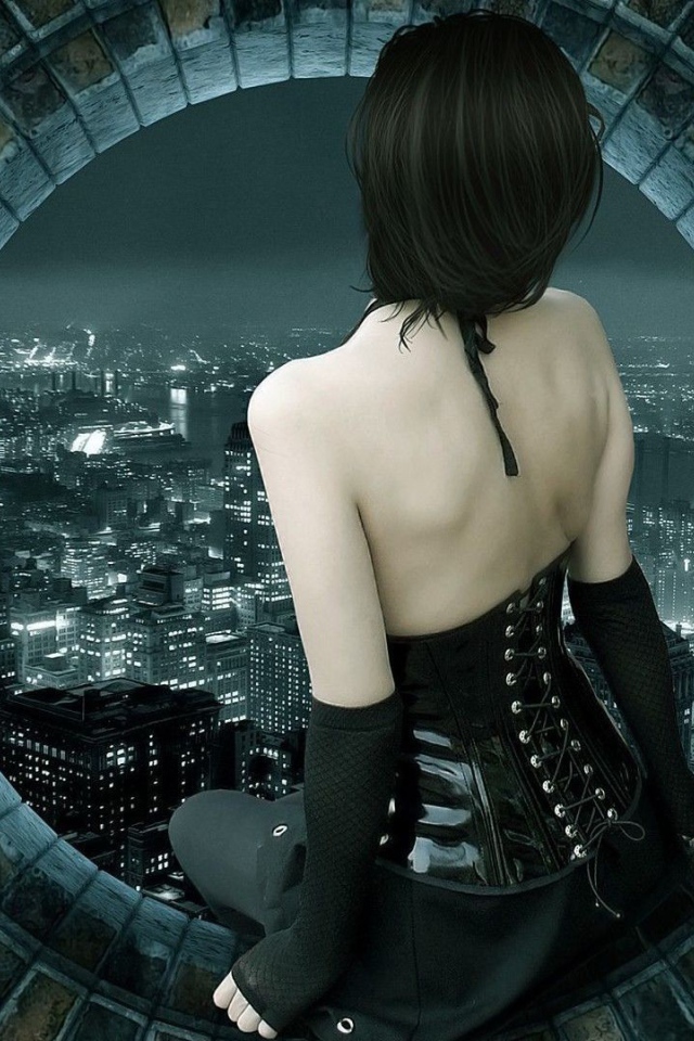 Девушка сидит на круглом окне