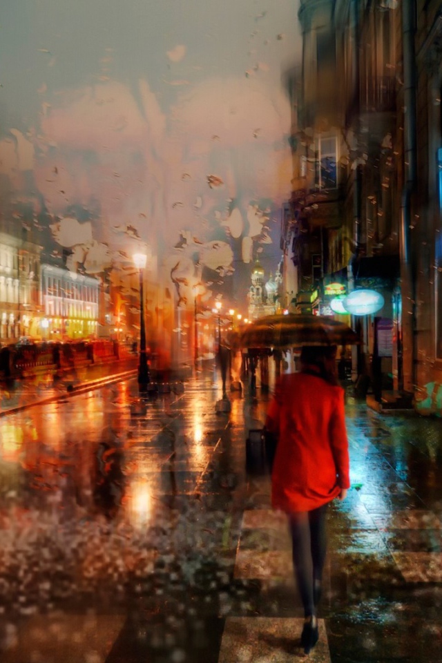 Девушка в красном пальто идет под дождем