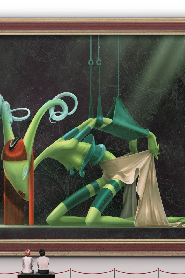 Милая пара смотрит на картину