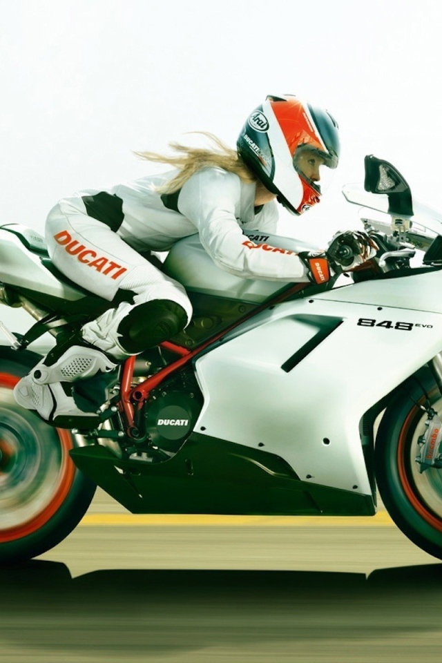 Blonde on a motorcycle Ducati