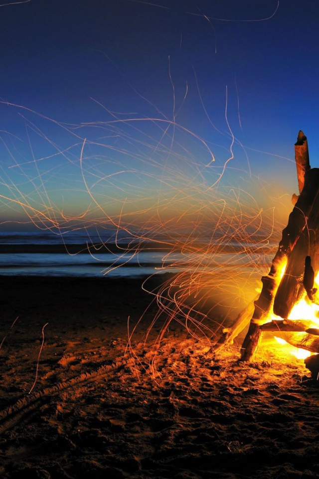 Bonfire in the sand on the beach