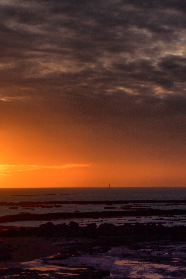 Закат на набережной в Испании