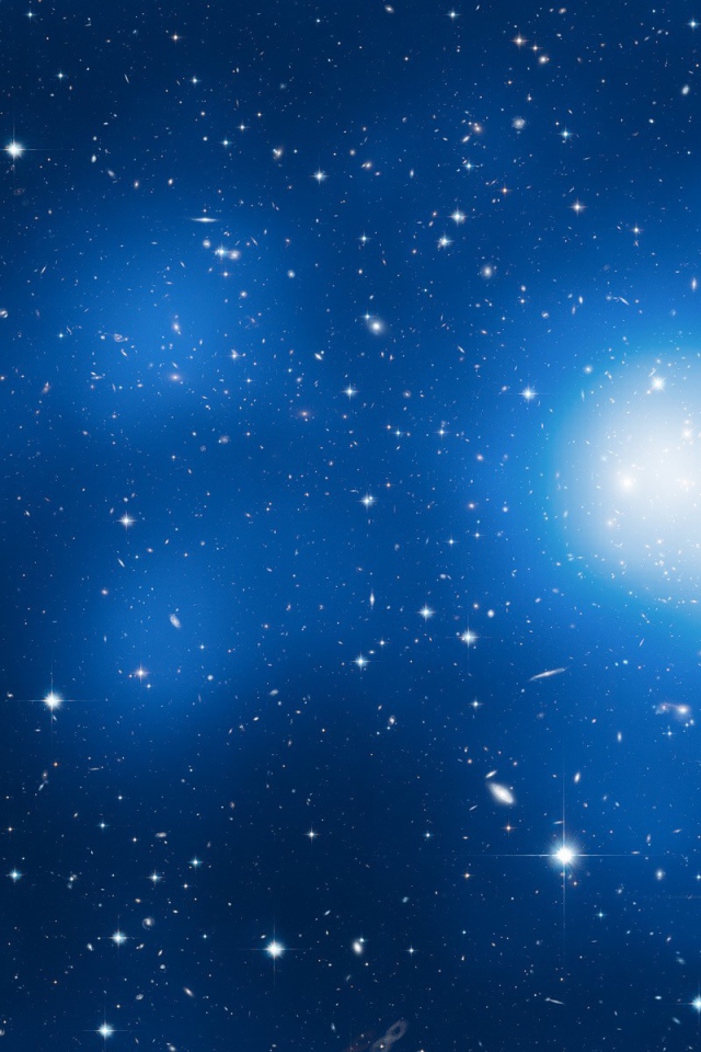 Звезды и галактики в голубом космосе