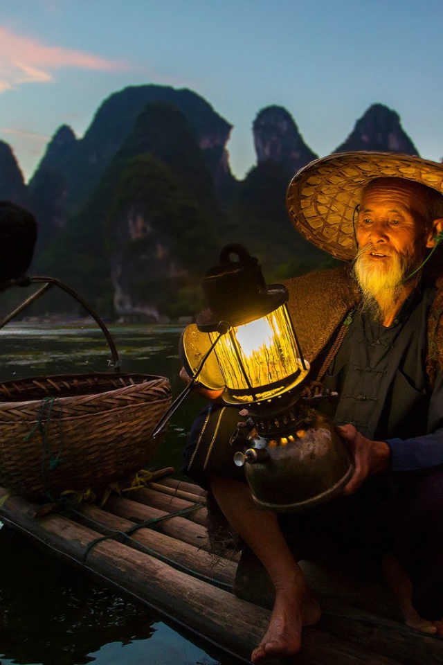 Fisherman and cormorant fishing in China