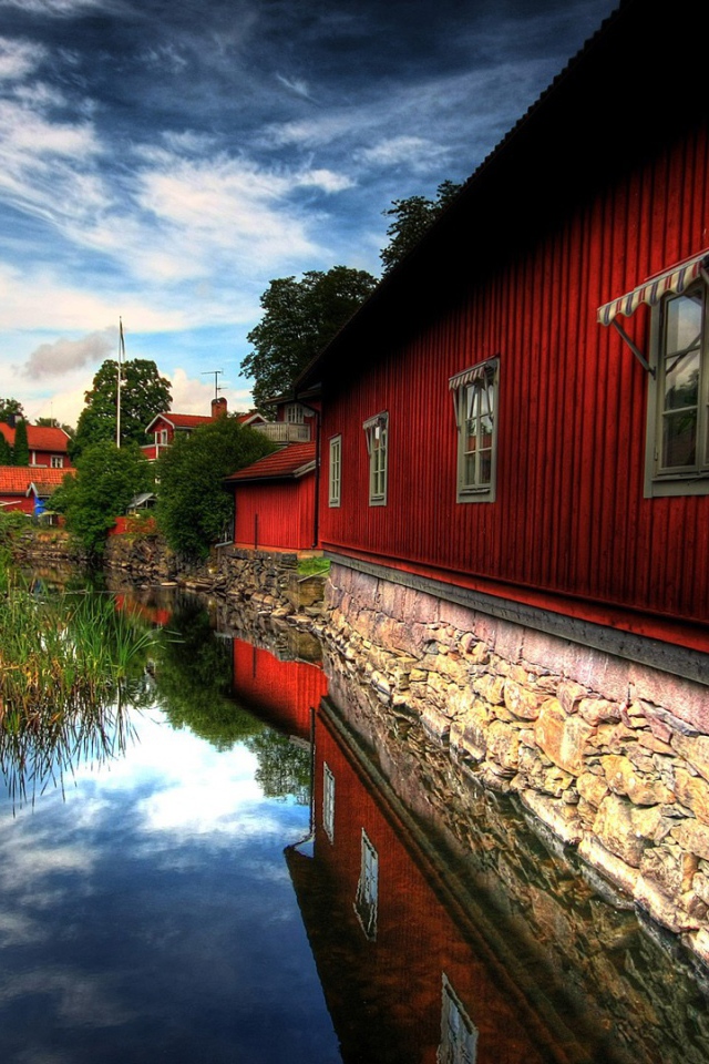 Красные домики у реки, Швеция