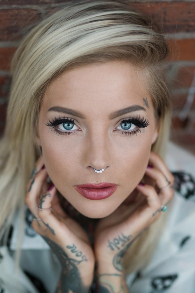 Piercing nose ring at the blonde