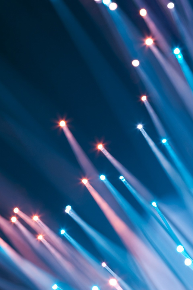 Светящиеся абстрактные разноцветные лучи 