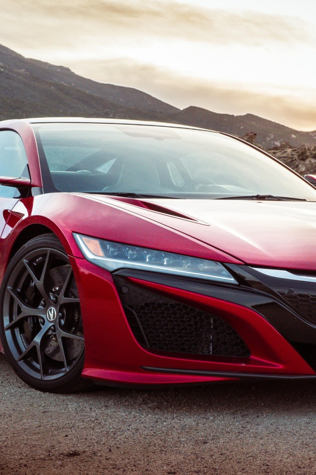 Красный автомобиль Acura NSX, 2017 на фоне гор 