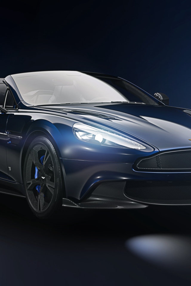 Синий автомобиль кабриолет Aston Martin Vanquish S Volante, 2018
