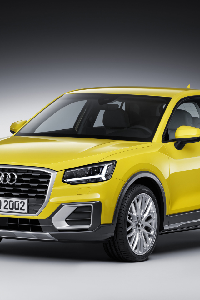Яркий желтый автомобиль  Audi Q2, 2017 