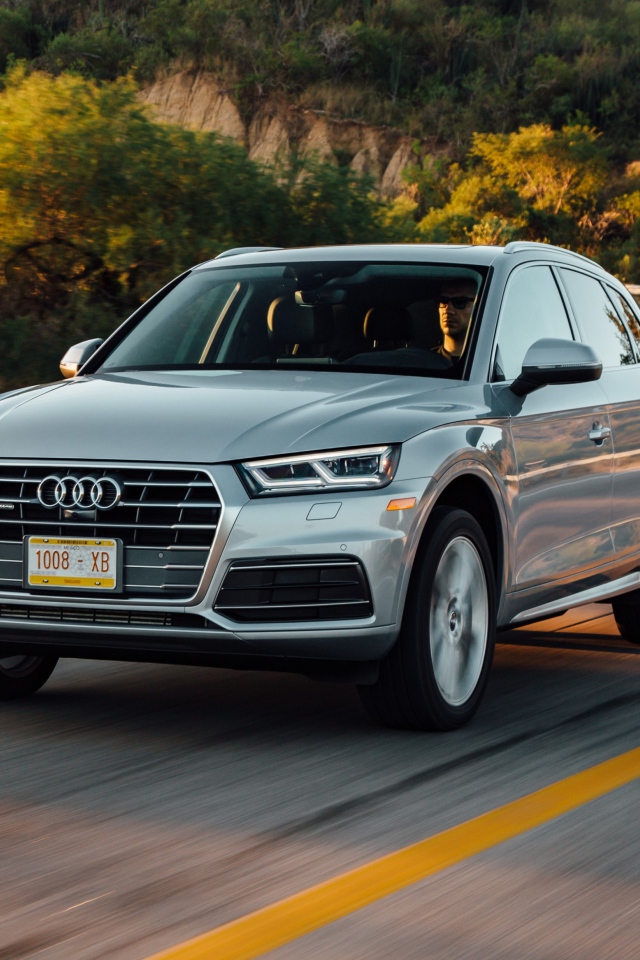 Silvery new car Audi Q5, 2018 on the road