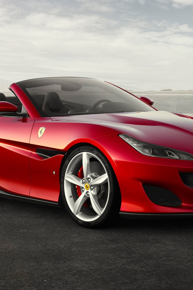 Красный спортивный автомобиль кабриолет Ferrari 812 Superfast