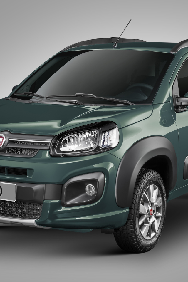 Зеленый автомобиль Fiat Uno Way на сером фоне