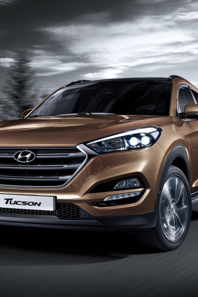 Автомобиль Hyundai Tucson коричневого цвета 