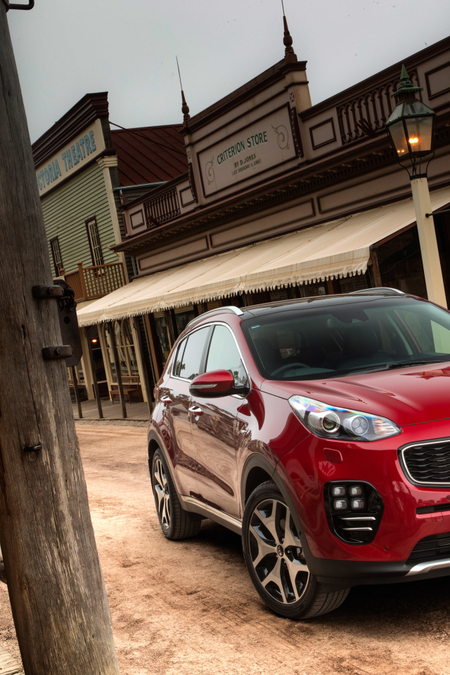 Красный внедорожник  Kia Sportage