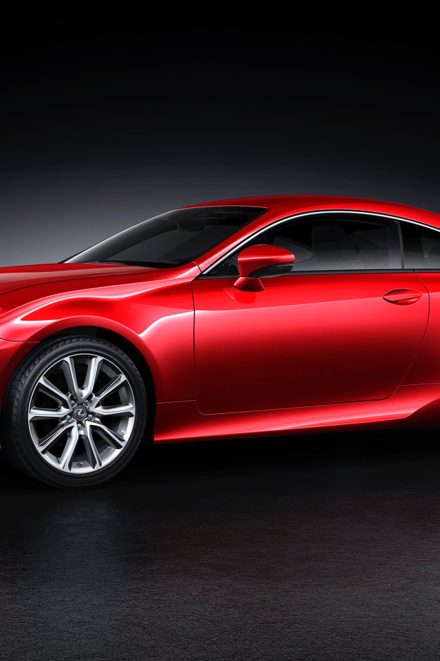 Красный автомобиль Lexus Unveils на сером фоне