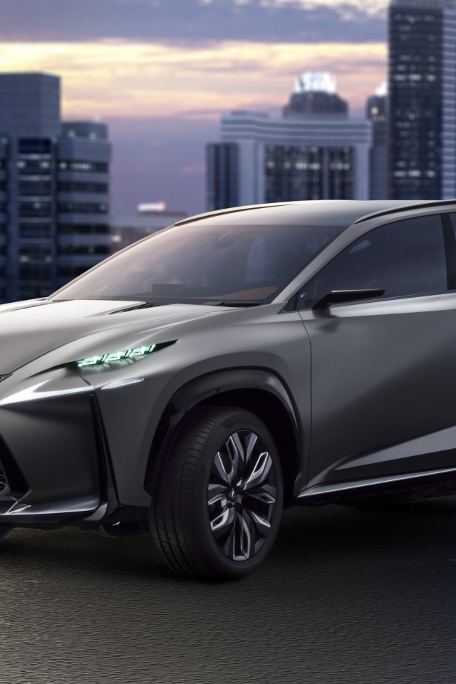 Серебристый кроссовер  Lexus LF-NX на фоне города