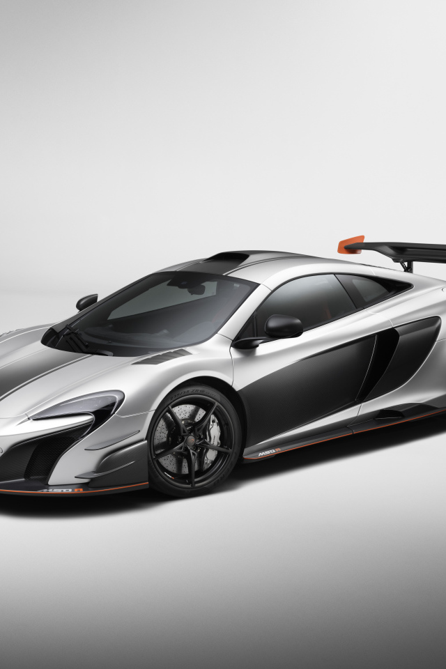 Серебристый автомобиль McLaren MSO R Coupe, 2017 на сером фоне