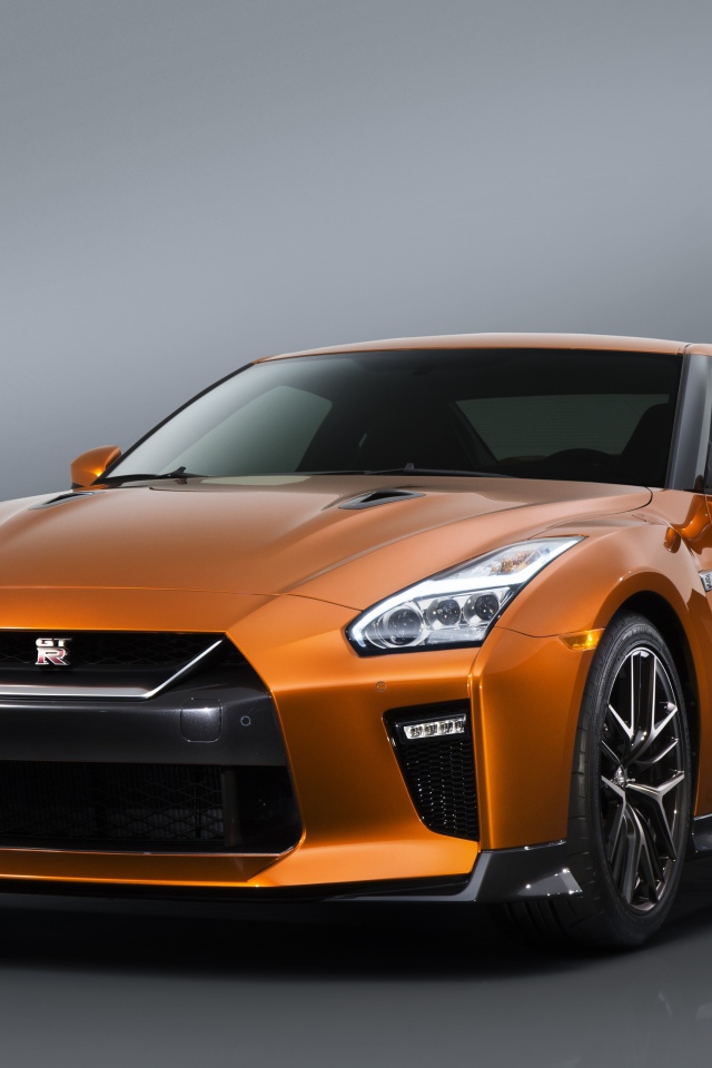 Новый автомобиль  Nissan GTR 2017 на сером фоне 