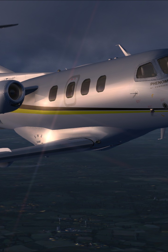 Embraer Phenom 100 в небе 