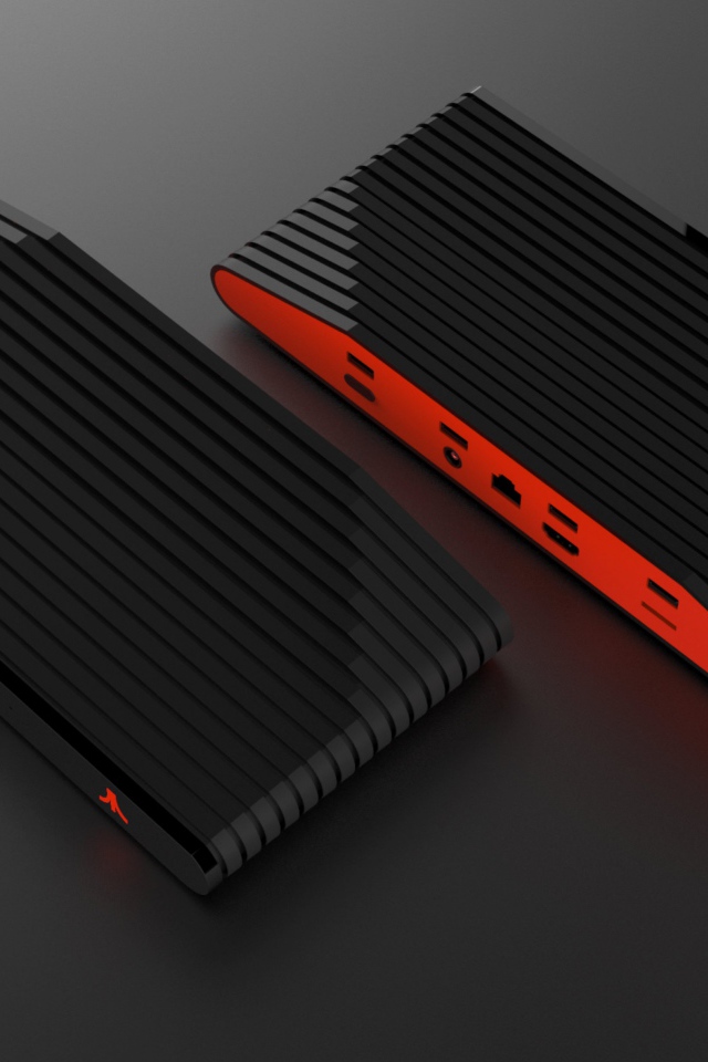 Новый игровой консоль Ataribox, 2018 на сером фоне