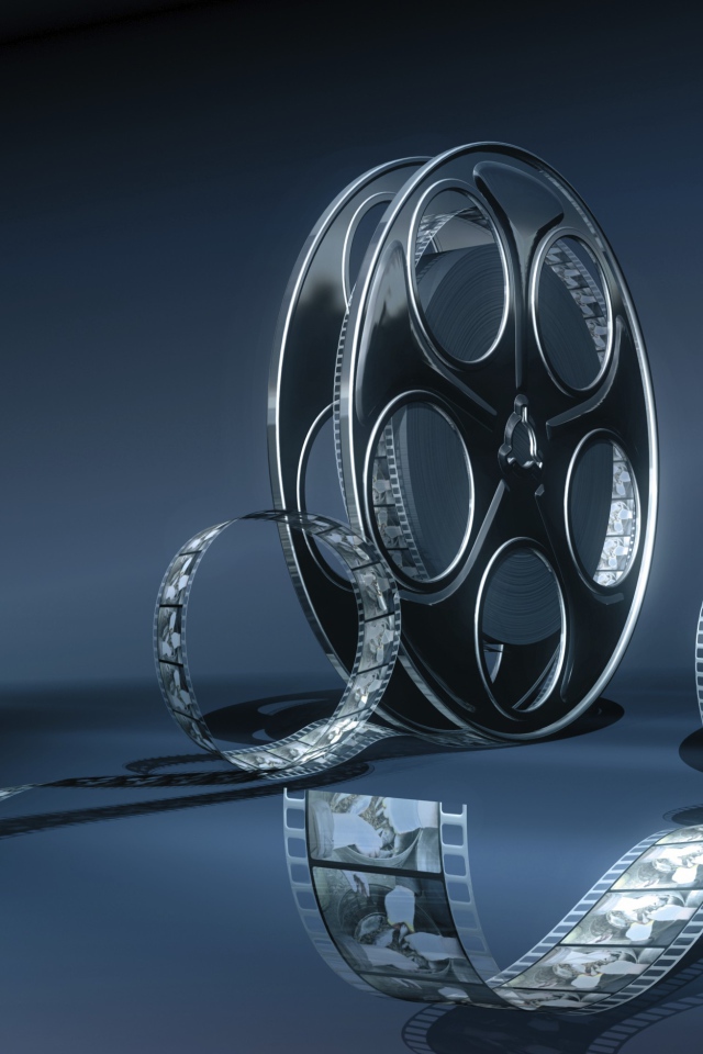 Кинопленка на бобине серый фон 