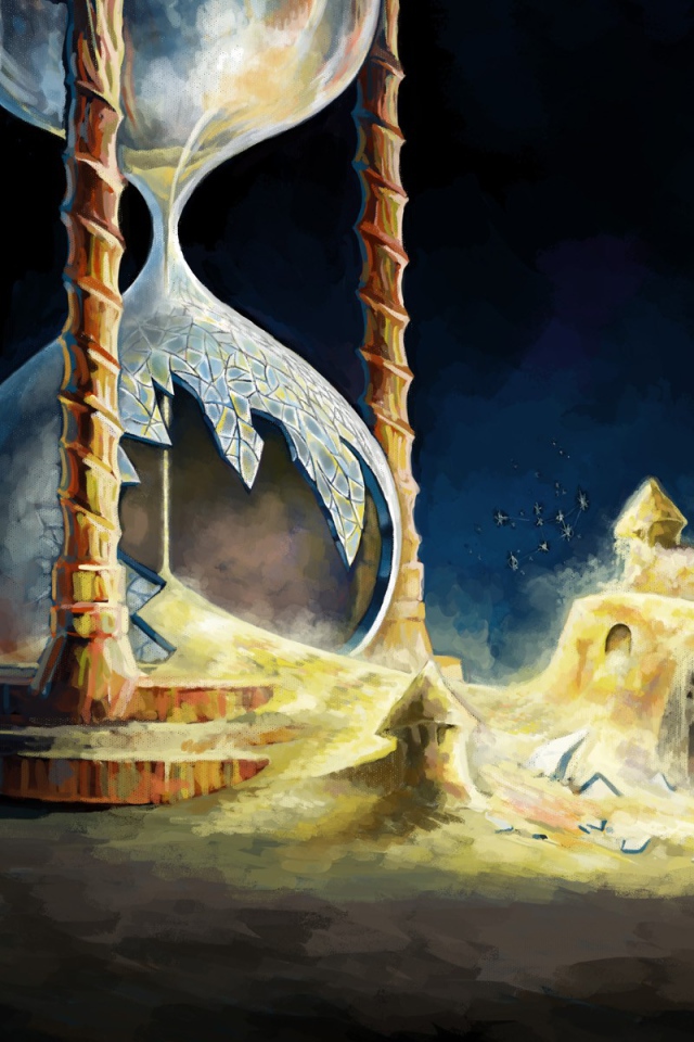 Разбитые песочные часы с замком из песка 