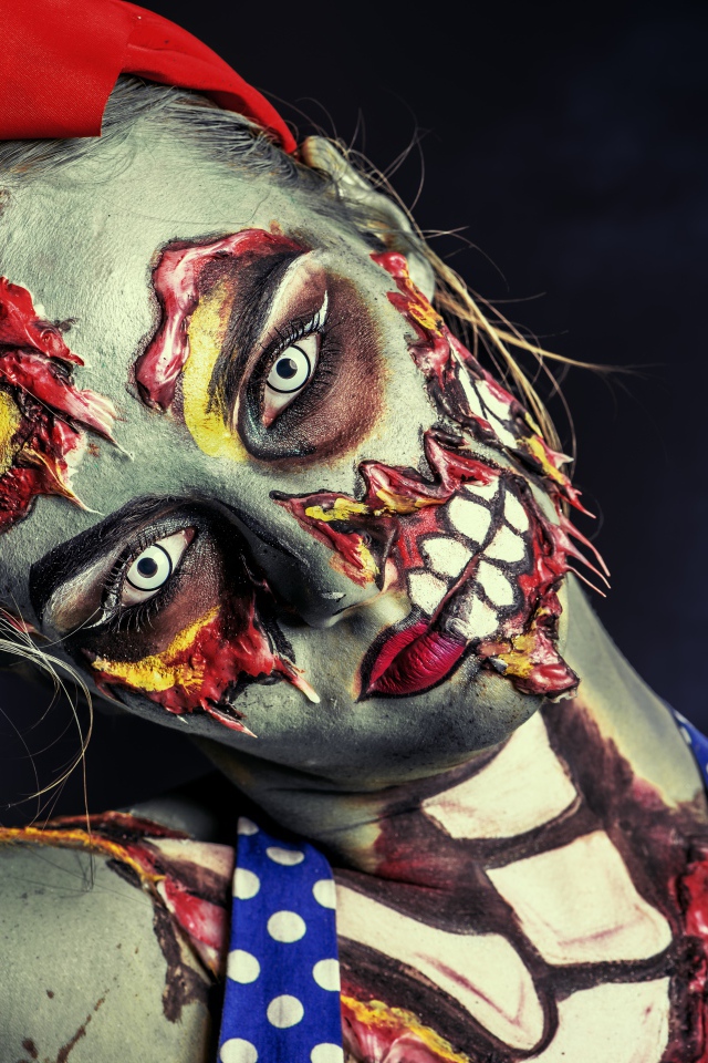 Young girl with a zombie make-up for Halloween