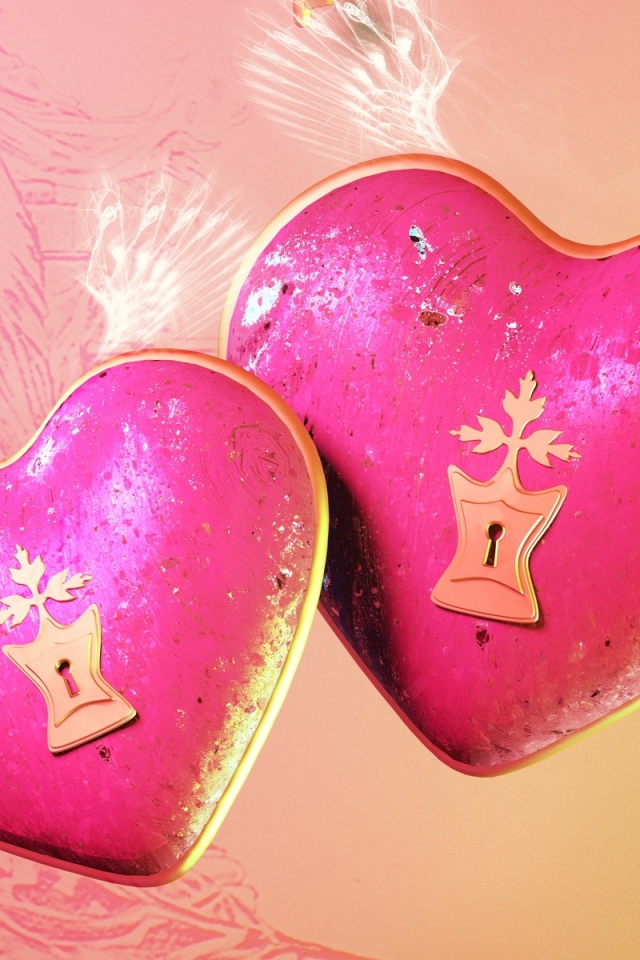 Два больших розовых сердца с замочными скважинами