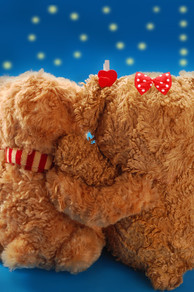 Два влюбленных медвежонка Тедди на фоне надписи Любовь