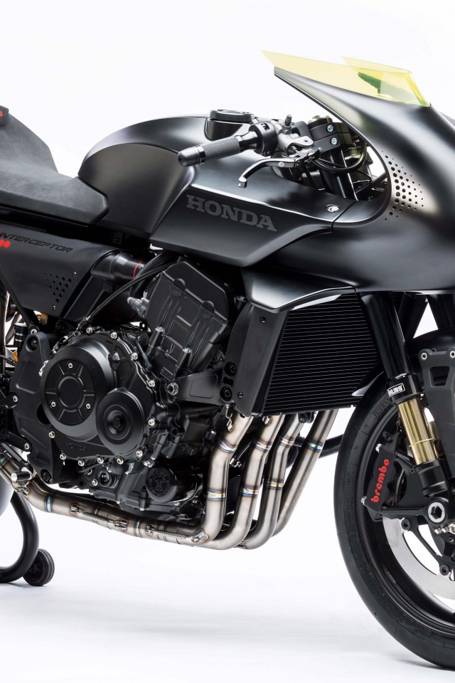 Черный мотоцикл Honda CB4 Interceptor на белом фоне