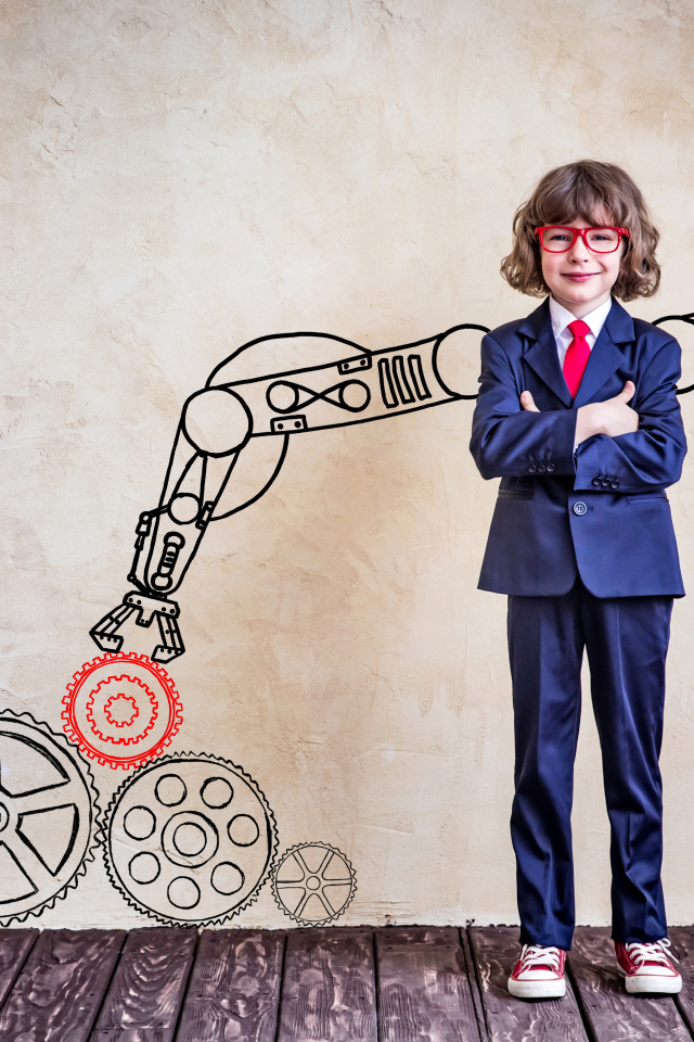 Маленький мальчик будущий ученый в костюме и очках