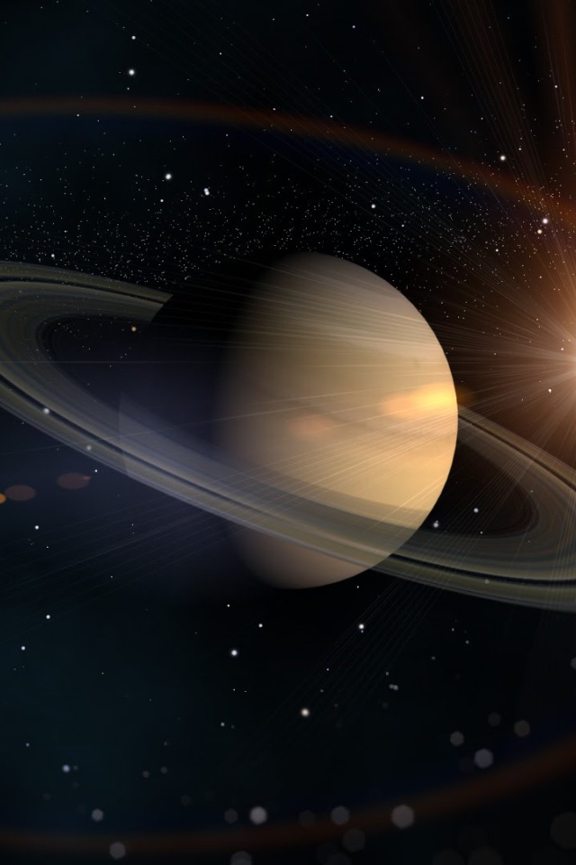 Планета Сатурн в лучах солнца 