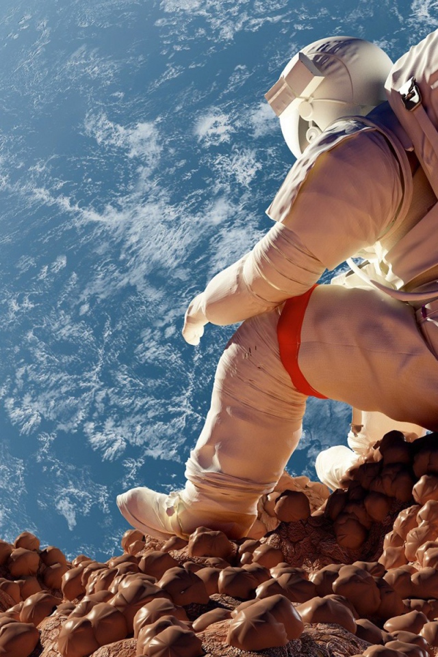 Астронавт на фоне планеты Земля 