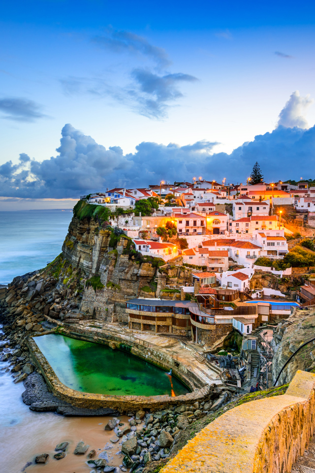 Evening city on a rocky coast, Portugal