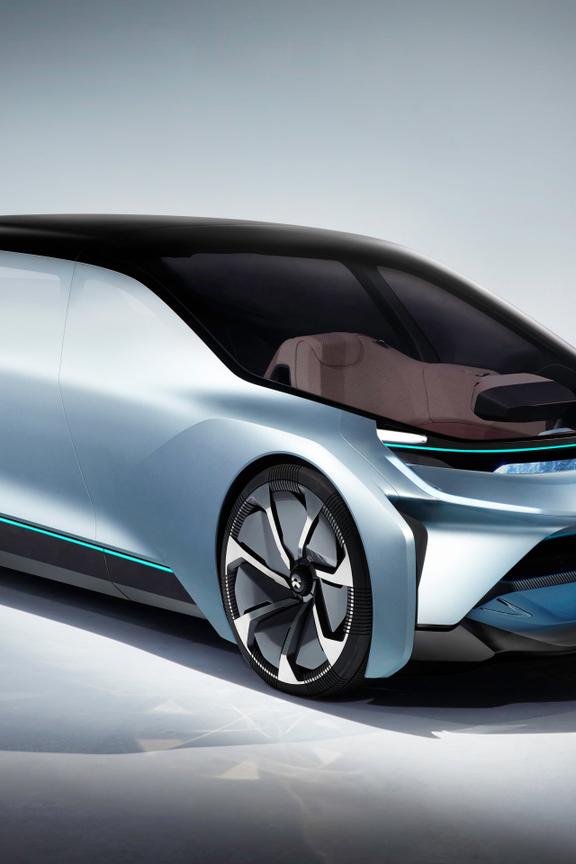 Электромобиль  Nio Eve на сером фоне 