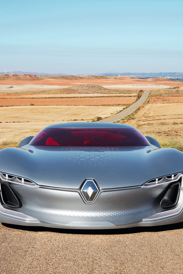 Стильный серебристый электромобиль  Renault Trezor на трассе 