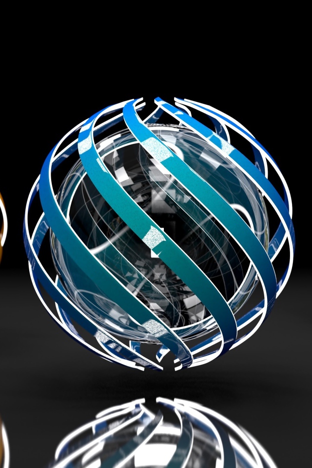 Три разноцветные сферы на сером фоне