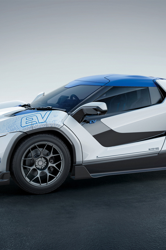 Автомобиль TaMo Racemo, 2018 на сером фоне